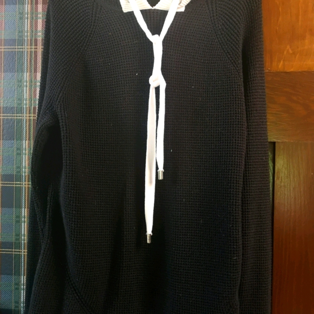 Sweater with hood.